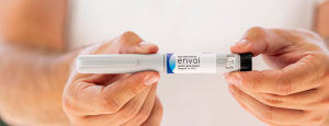 Envoi Pen Injector held by two hands
