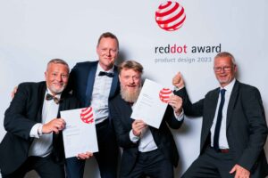 Four men receiving reddot award for product design 2023
