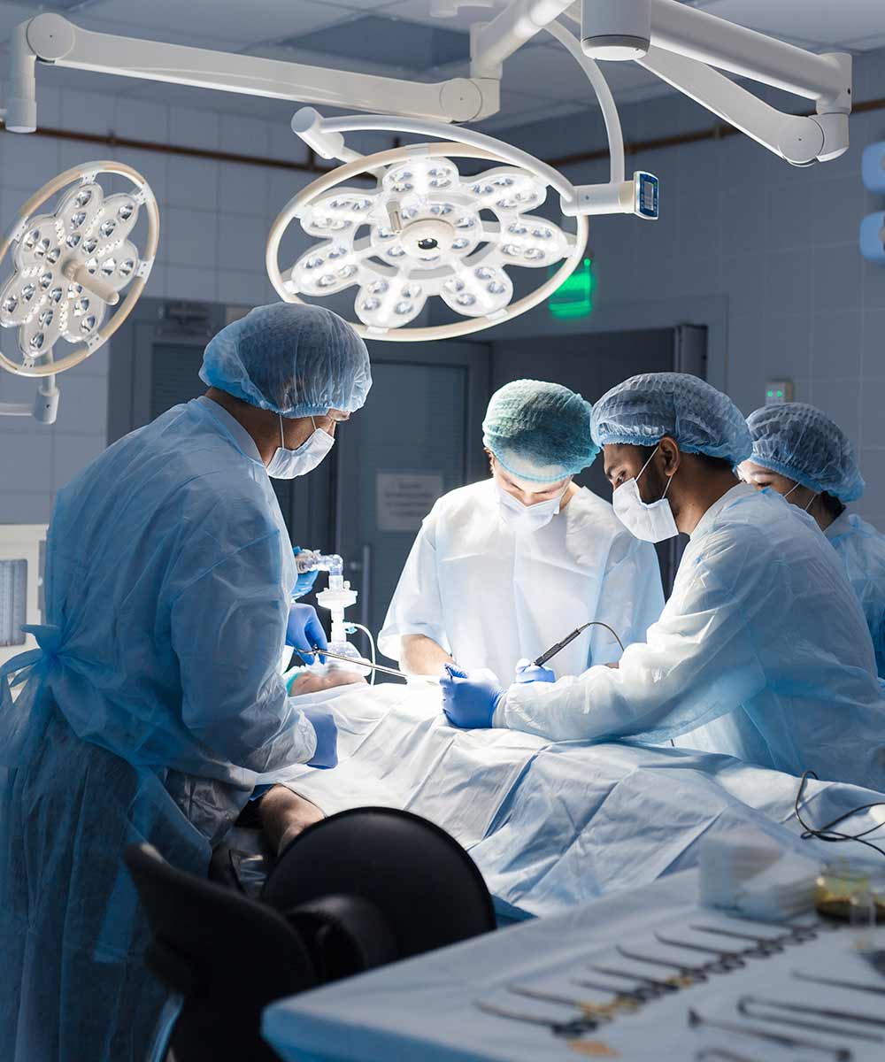 group of surgeons in operating room